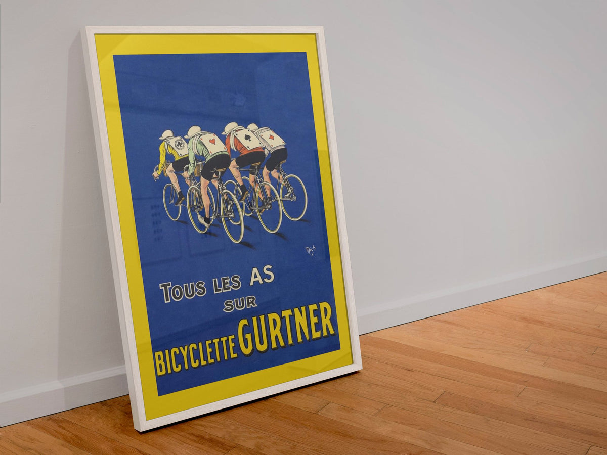 Bicyclette Gurtner poster in a white frame leaning against a wall