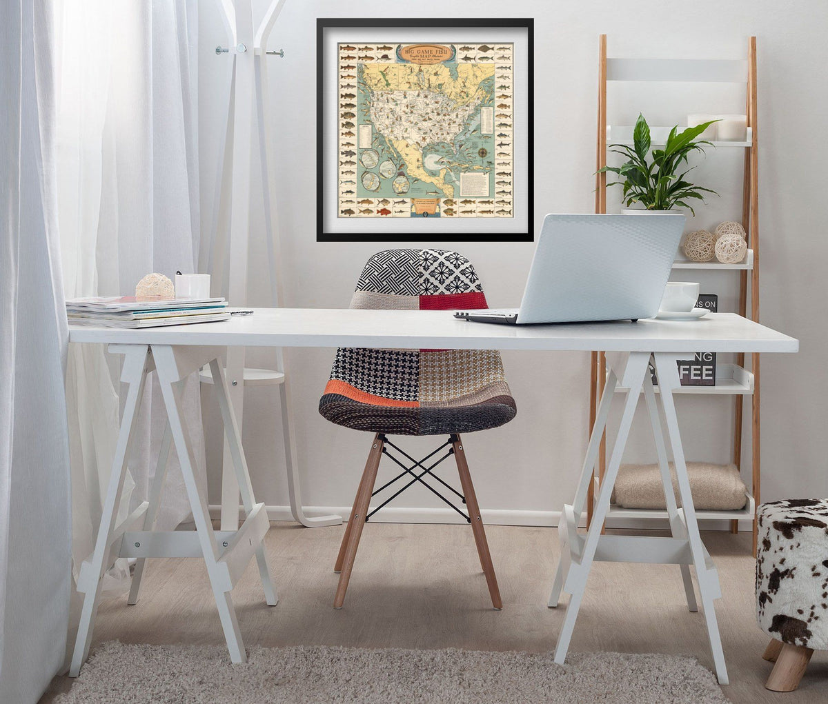 Big Game Fish 1936 Map print framed above a white desk in a home office