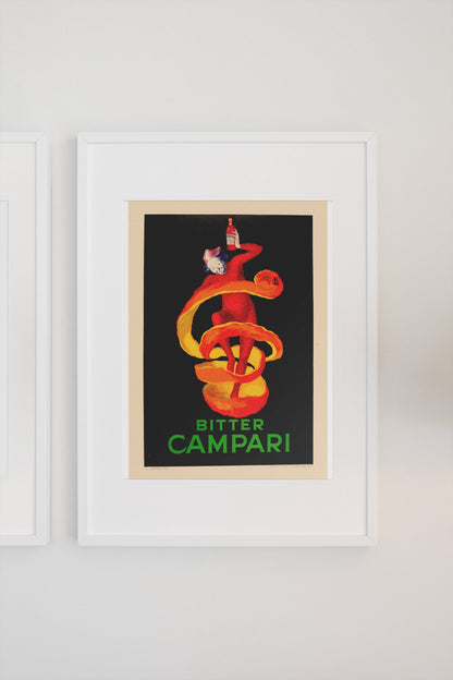 Bitter Campari by Cappiello poster in a white frame on a light wall