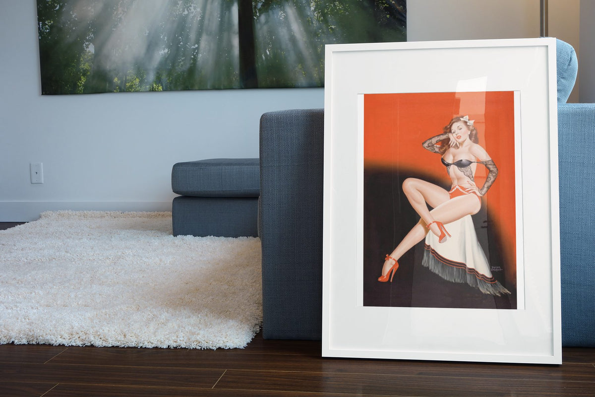 Black Lace Beauty poster leaning beside a blue sofa