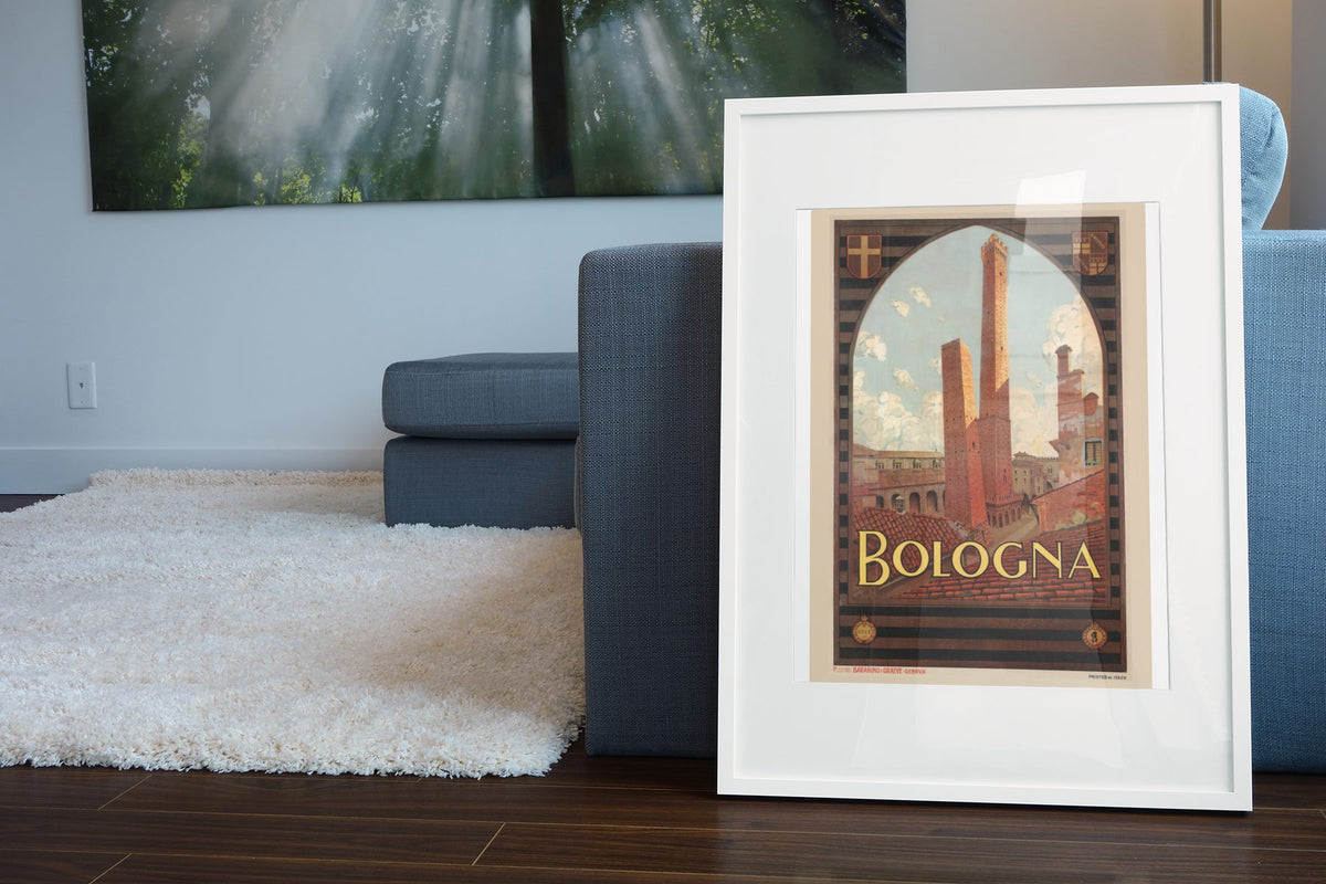 Bologna poster leaning beside a blue sofa