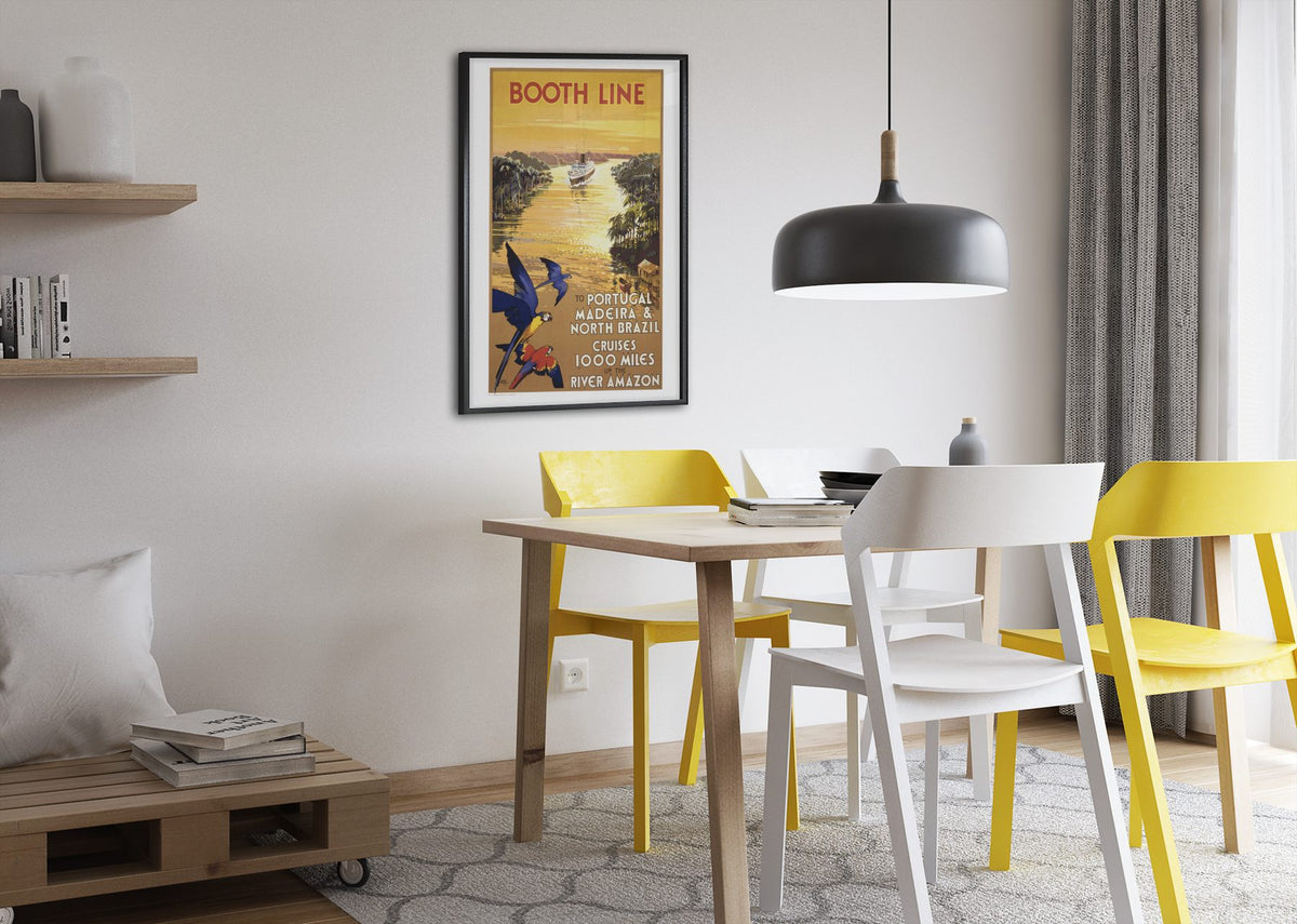 Booth Line Amazon River Cruises poster framed above a dining table