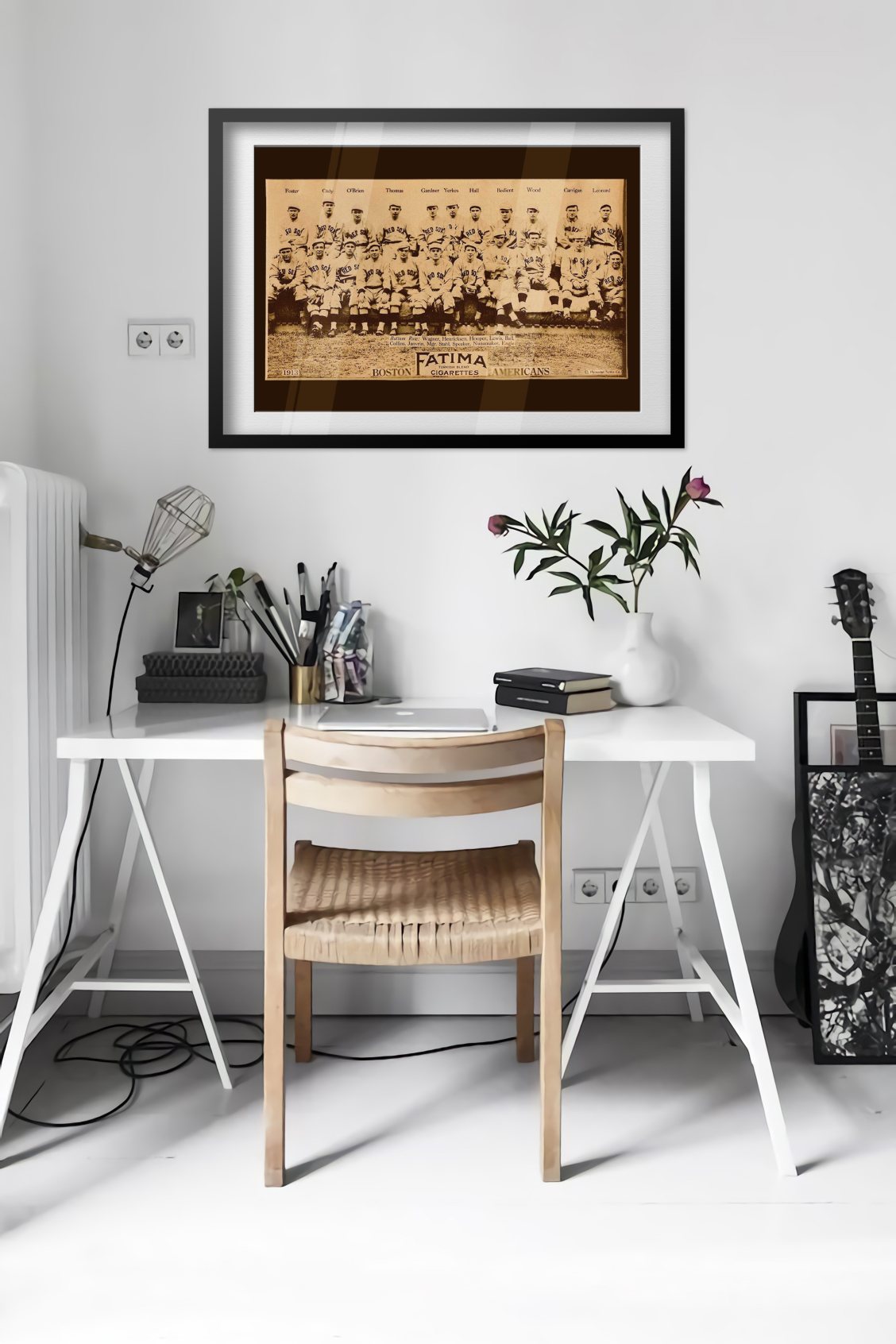 Boston Americans Team Photo poster framed above a desk in a bright white room
