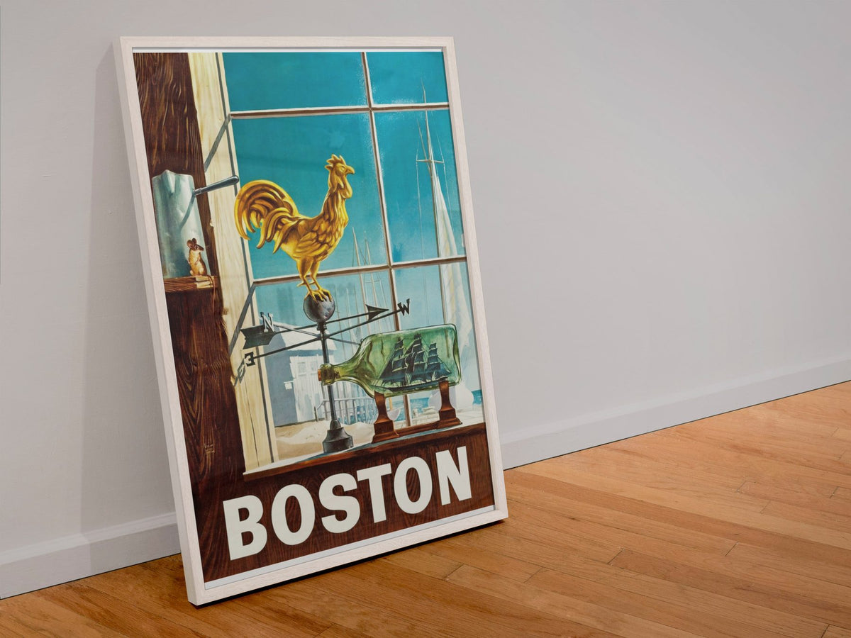 Boston Fly TWA poster in a white frame leaning against a wall