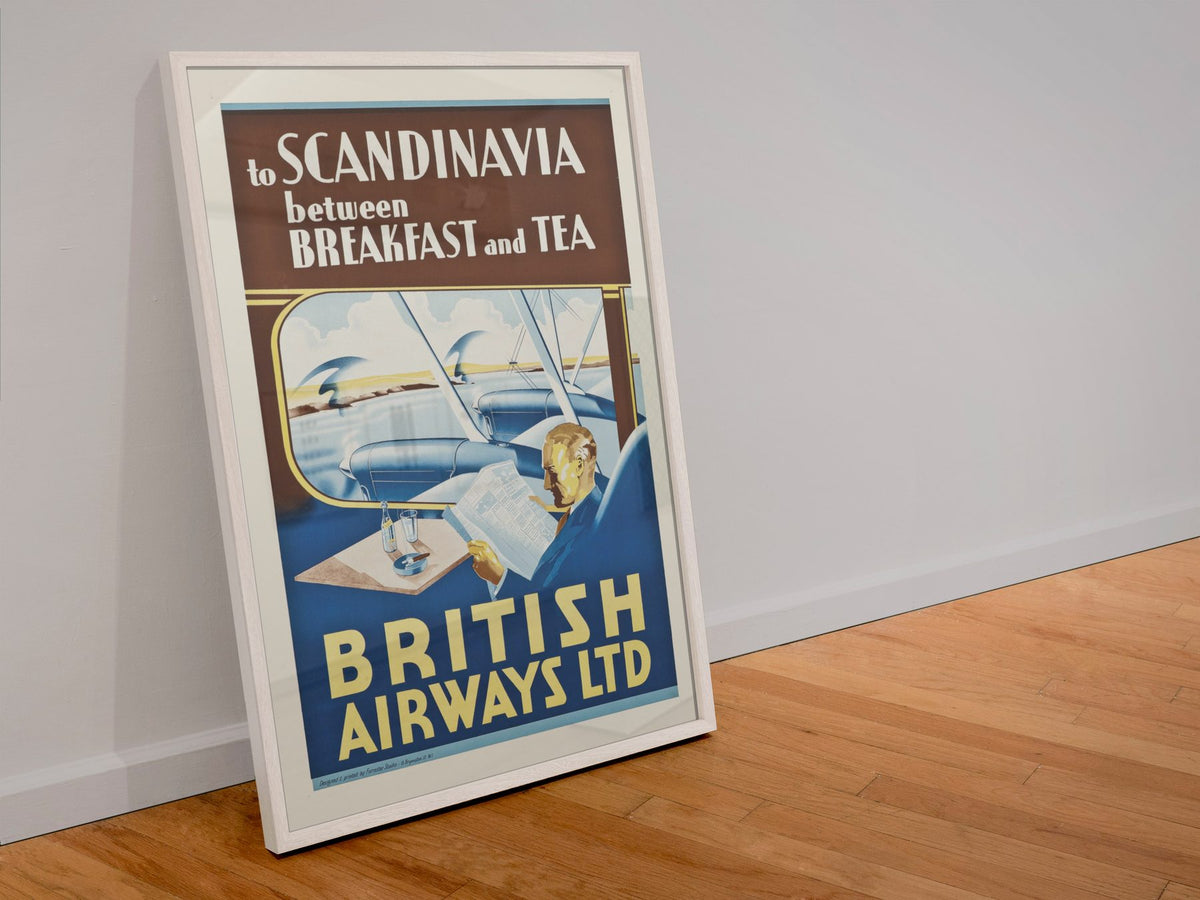 British Airways to Scandinavia poster in a white frame leaning against a wall