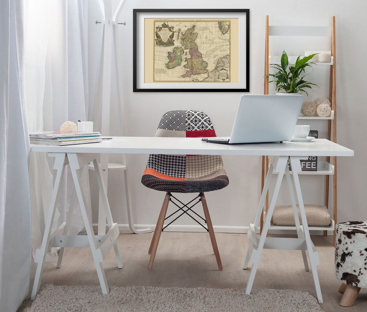 British Isles 1700s Map print framed above a white desk in a home office
