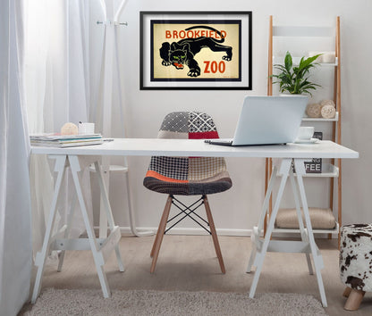 Brookfield Zoo Black Panther poster framed above a white desk in a home office