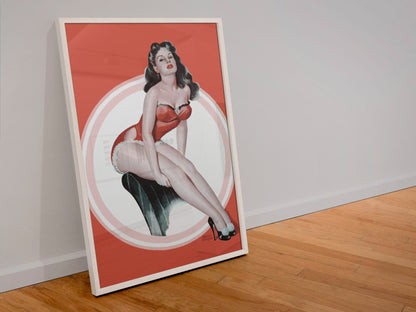 Brunette in Red poster in a white frame leaning against a wall