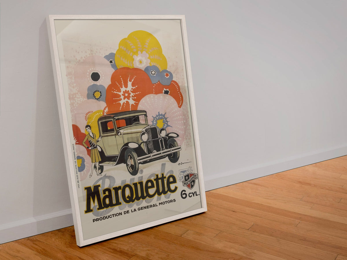 Buick Marquette poster in a white frame leaning against a wall