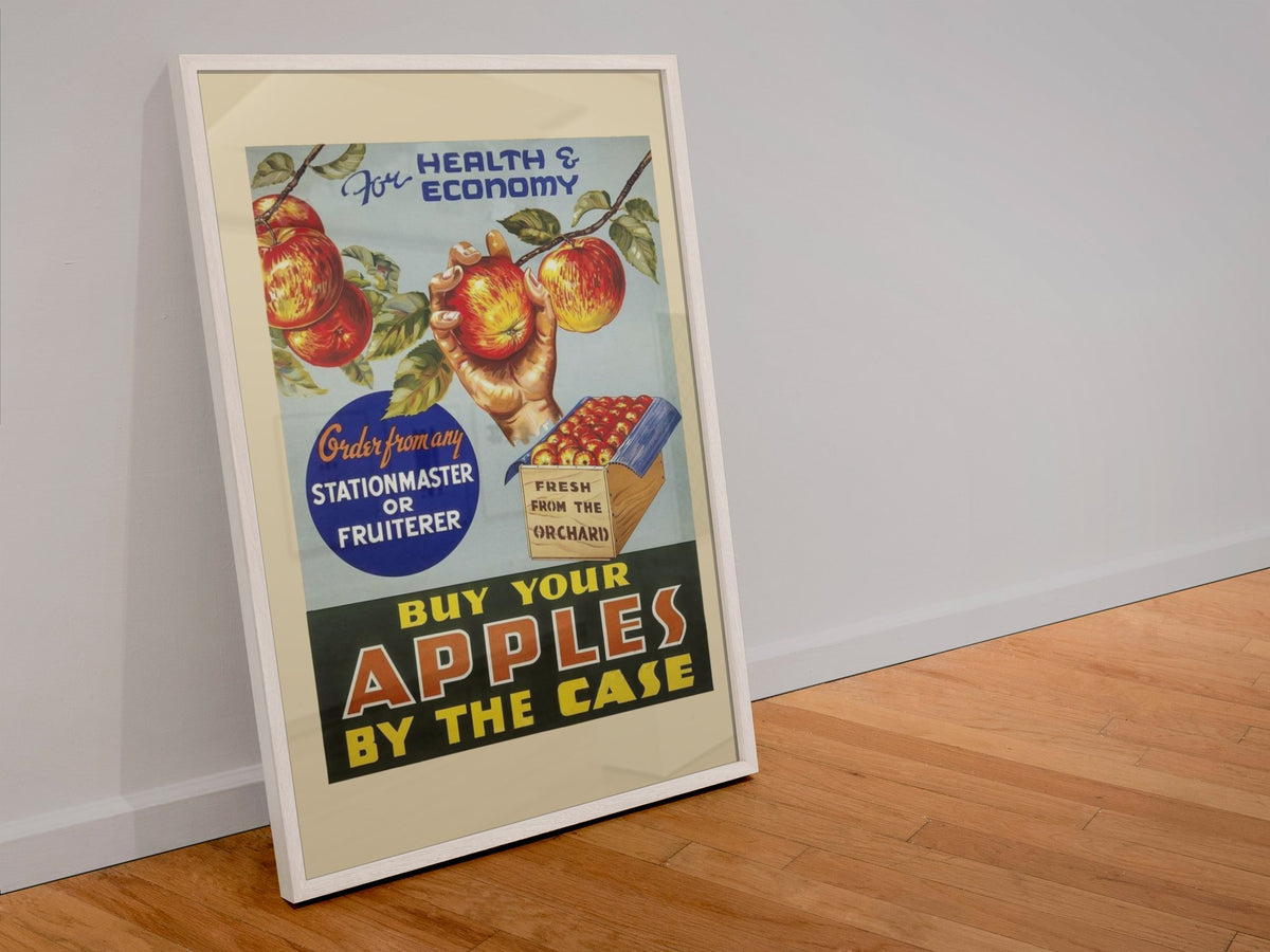 Buy Apples by the Case 1935 poster in a white frame leaning against a wall
