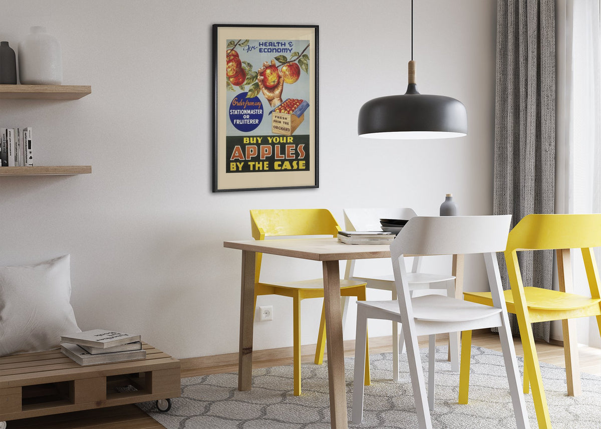 Buy Apples by the Case 1935 poster framed above a dining table