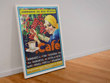 Cafe Brazilian Coffee poster in a white frame leaning against a wall