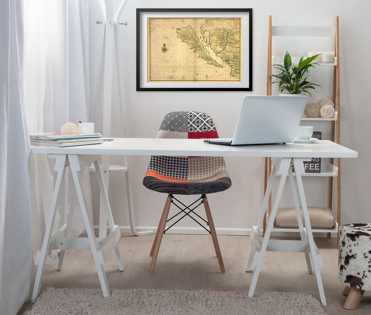 California as an Island Map print framed above a white desk in a home office
