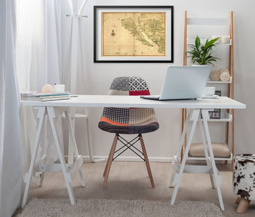 California as an Island Map print framed above a white desk in a home office