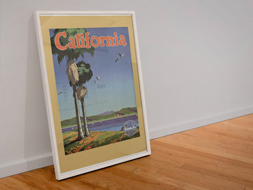 California Santa Fe poster in a white frame leaning against a wall