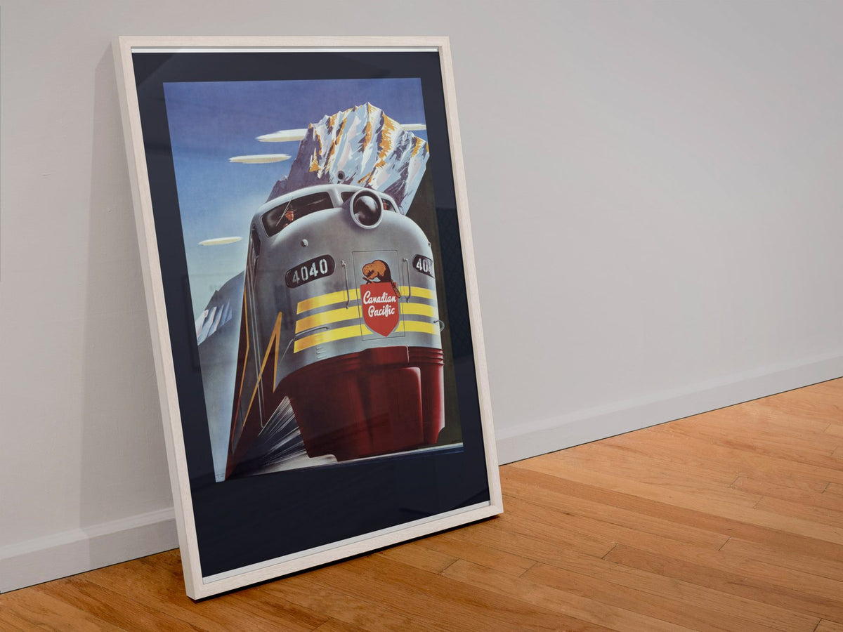 Canadian Pacific Locomotive 1950s poster in a white frame leaning against a wall