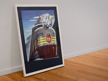 Canadian Pacific Locomotive 1950s poster in a white frame leaning against a wall