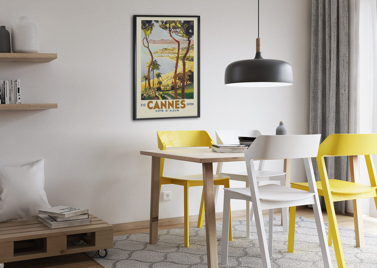Cannes Cote d Azur poster framed above a dining table