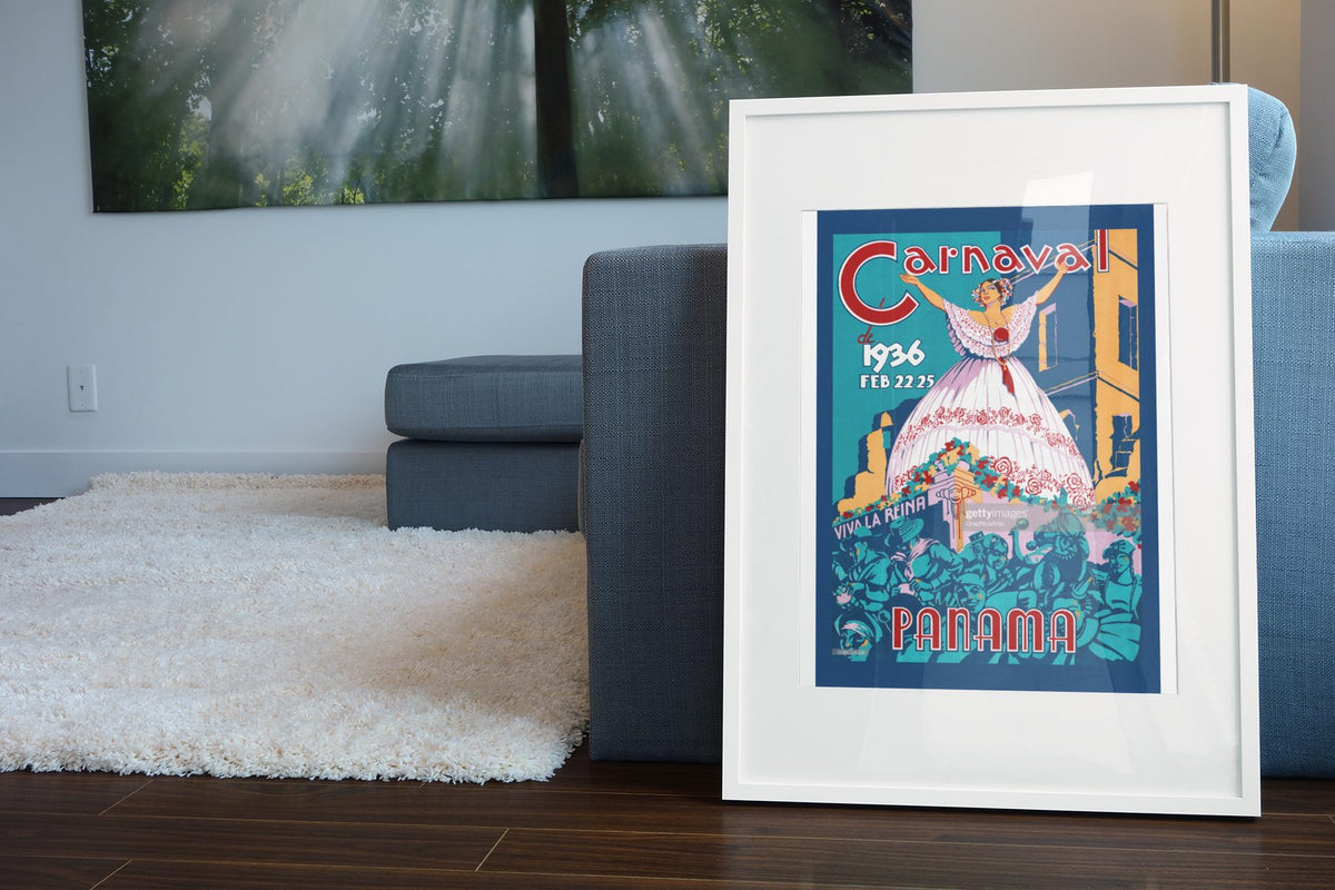 Carnaval Panama 1936 poster leaning beside a blue sofa