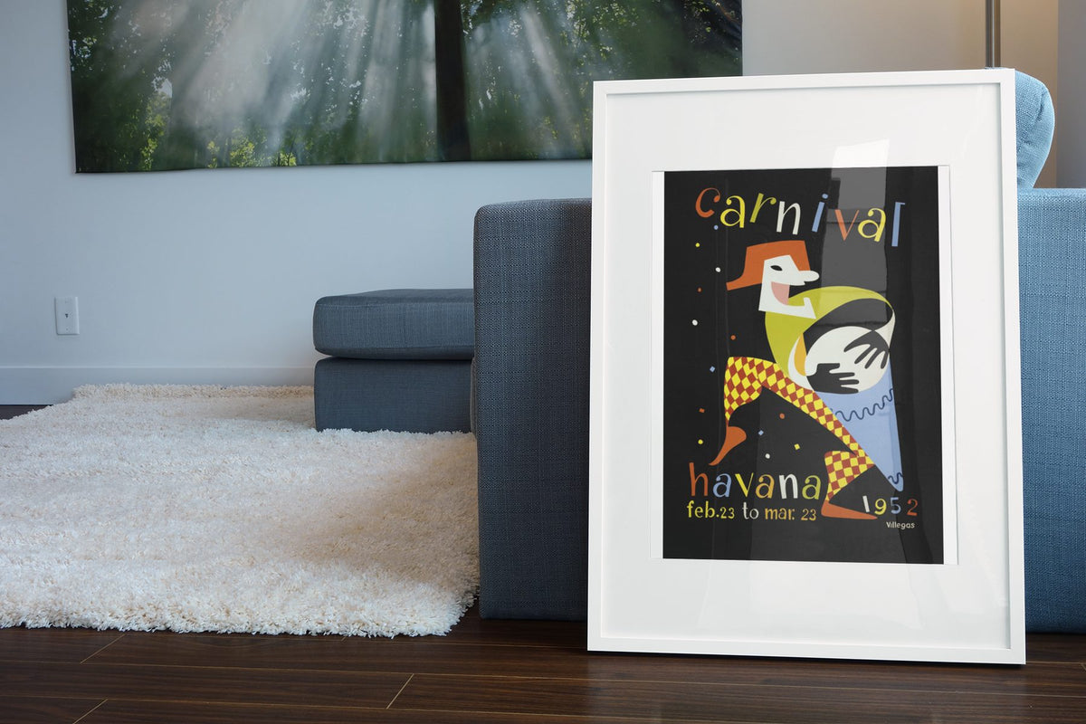 Carnival Havana 1952 poster leaning beside a blue sofa