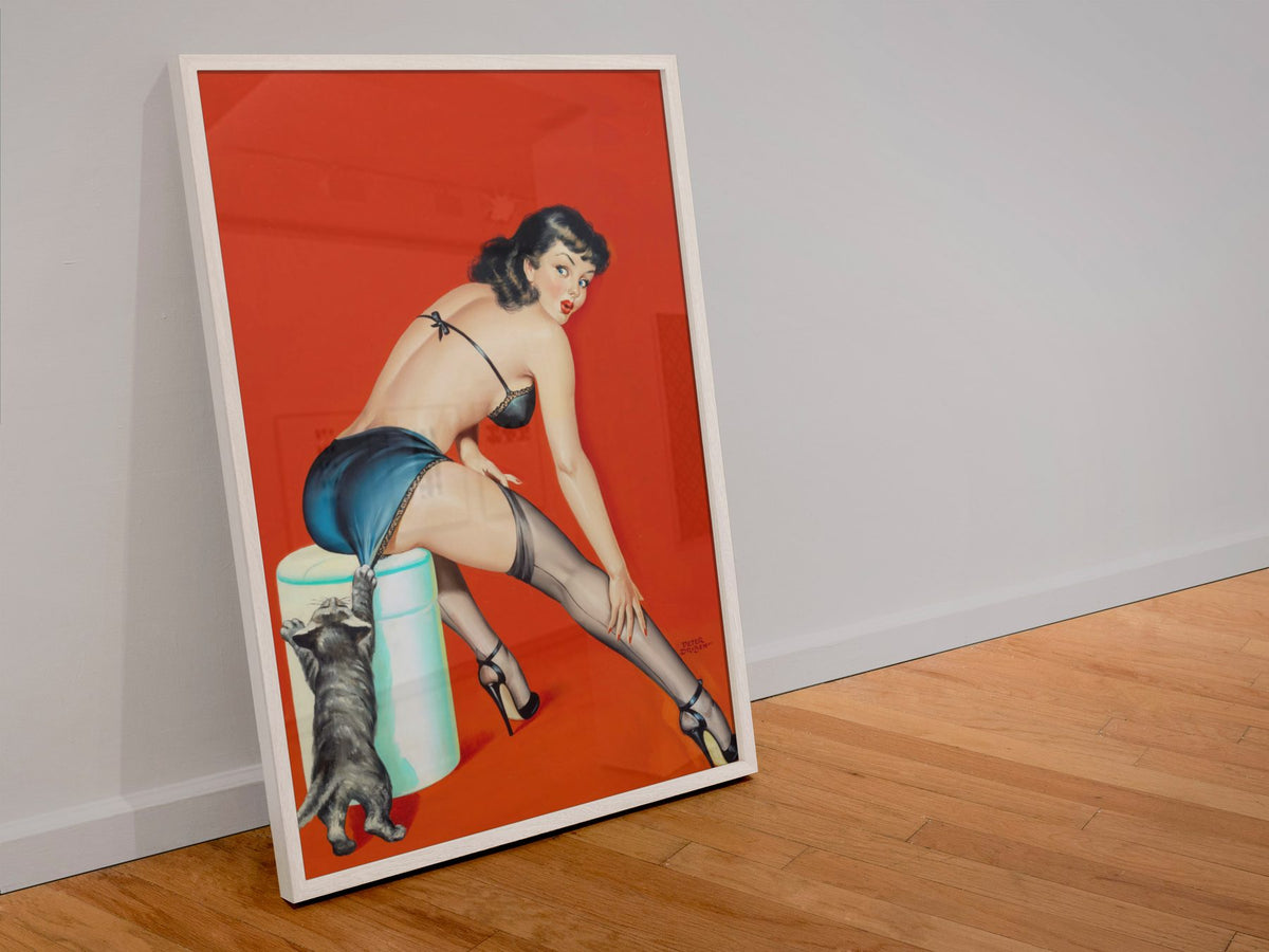 Cat Scratch Fever poster in a white frame leaning against a wall