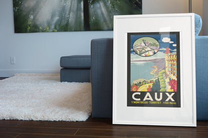 Caux sur Montreux poster leaning beside a blue sofa