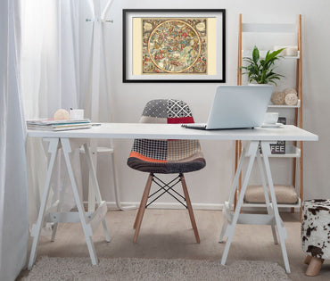 Cellarius Christian Star Chart 1660 print framed above a white desk in a home office