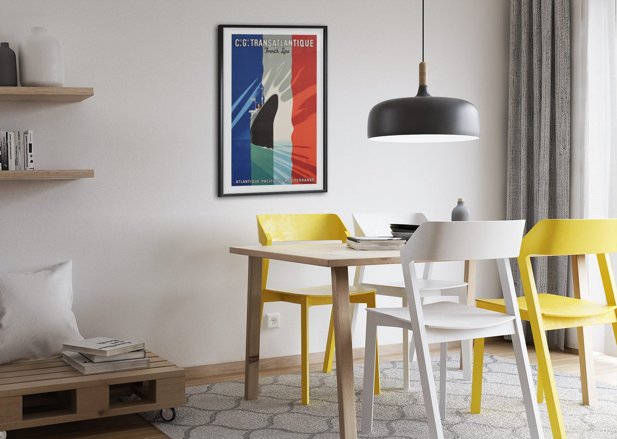 CGT Transatlantique French Line poster framed above a dining table