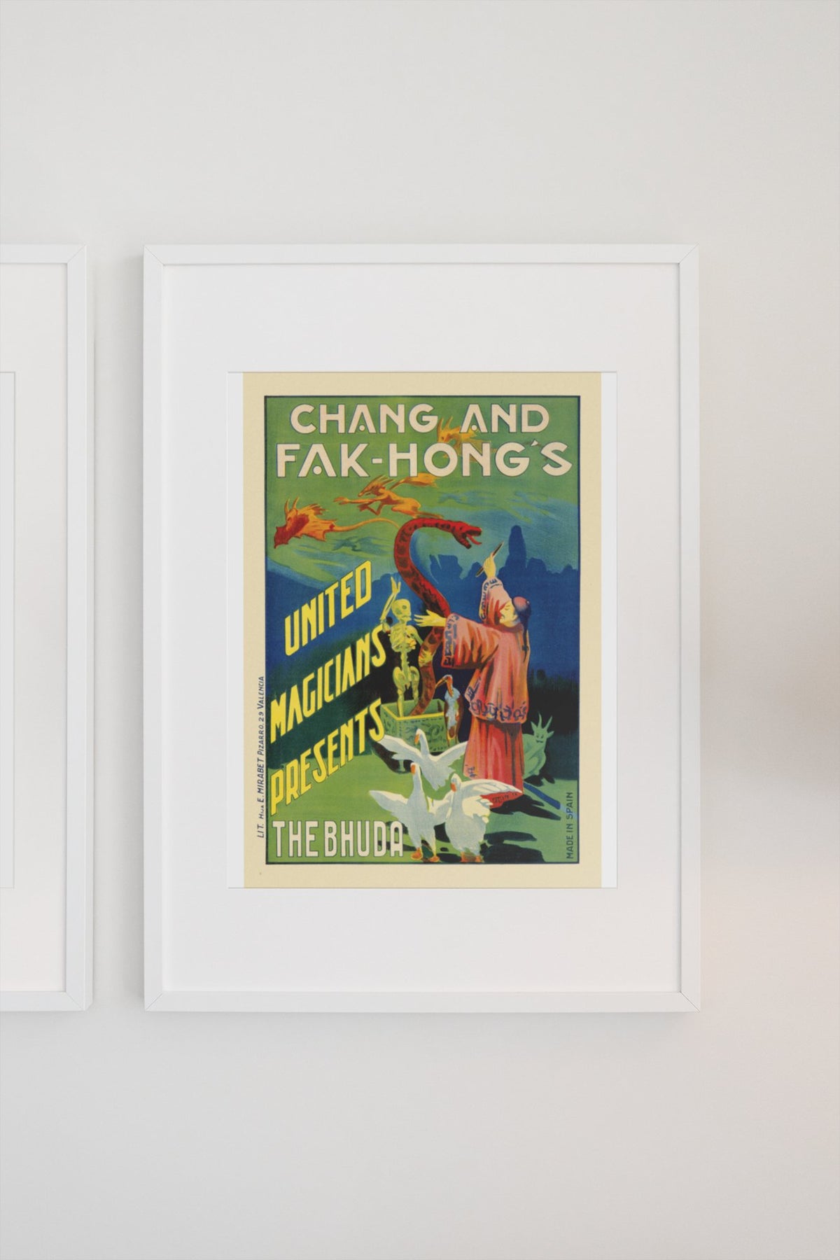 Chang and Fak-Hong The Bhuda poster on a light wall