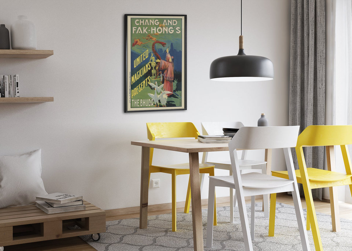 Chang and Fak-Hong The Bhuda poster framed above a dining table