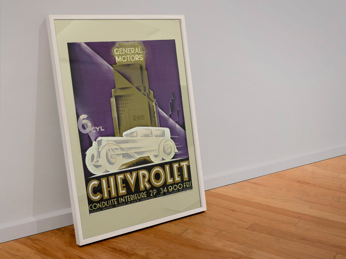 Chevrolet Conduite Intérieure poster in a white frame leaning against a wall
