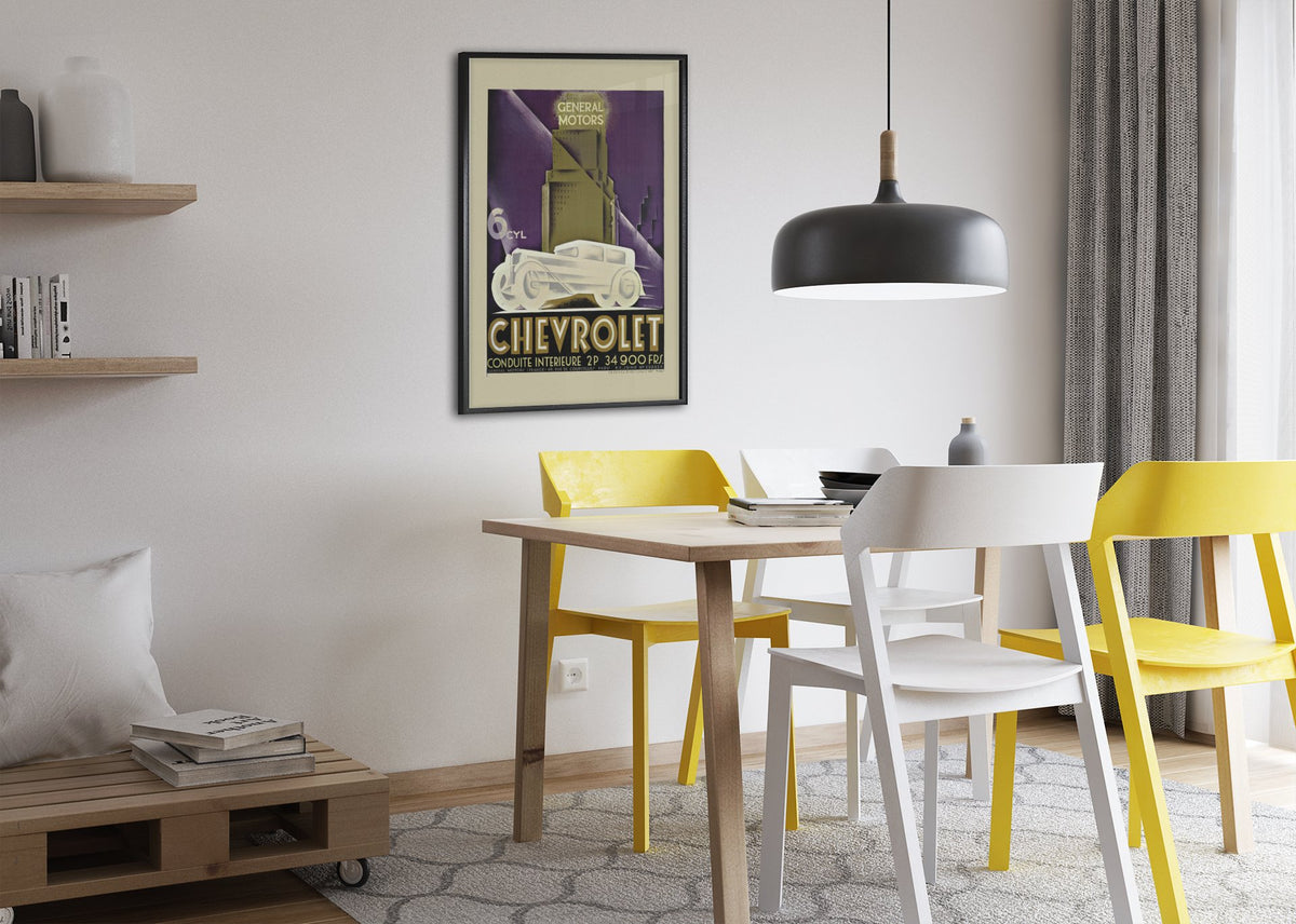 Chevrolet Conduite Intérieure poster framed above a dining table