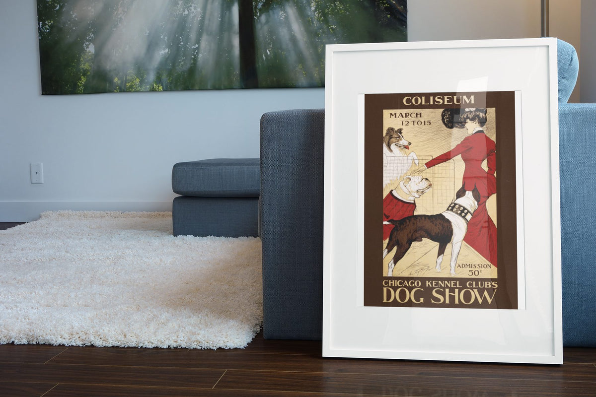 Chicago Kennel Club Dog Show poster leaning beside a blue sofa