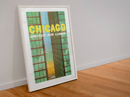 Chicago United Air Lines 1961 poster in a white frame leaning against a wall