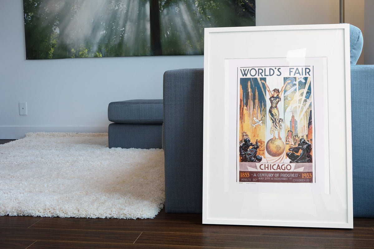 Chicago Worlds Fair 1933 poster leaning beside a blue sofa