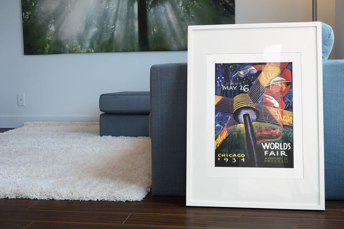 Chicago Worlds Fair 1934 poster leaning beside a blue sofa