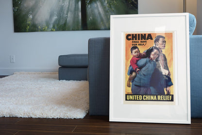 China Shall Have Our Help United China Relief poster leaning beside a blue sofa
