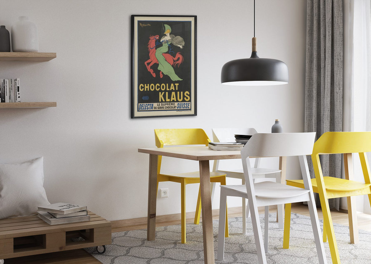 Chocolat Klaus Cappiello poster framed above a dining table