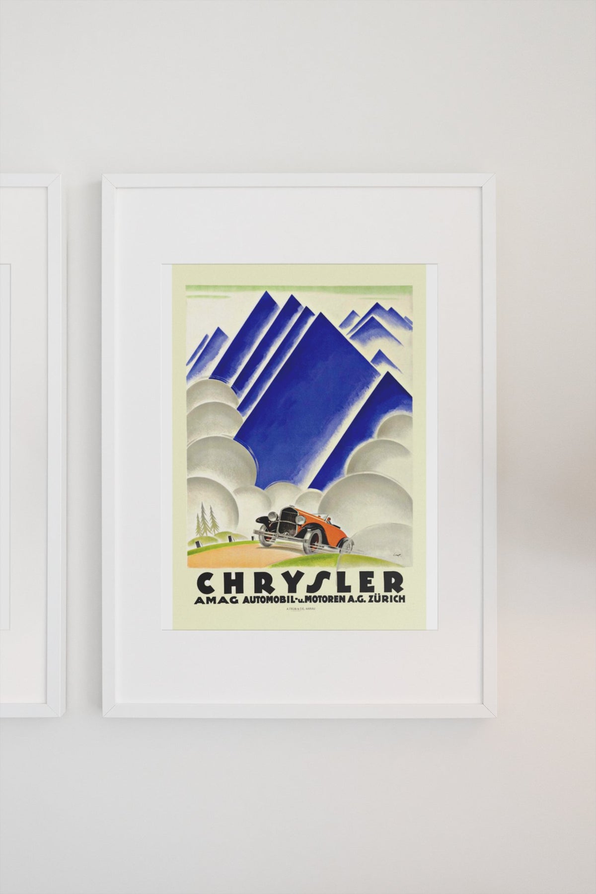 Chrysler AMAG Zürich poster in a white frame on a light wall