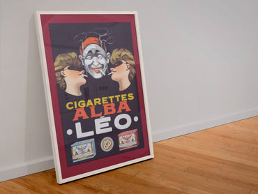 Cigarettes Alba Leo poster in a white frame leaning against a wall