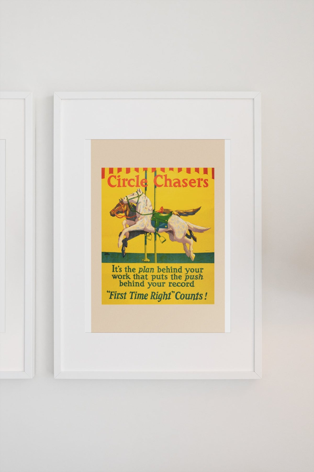 Circle Chasers poster in a white frame on a light wall