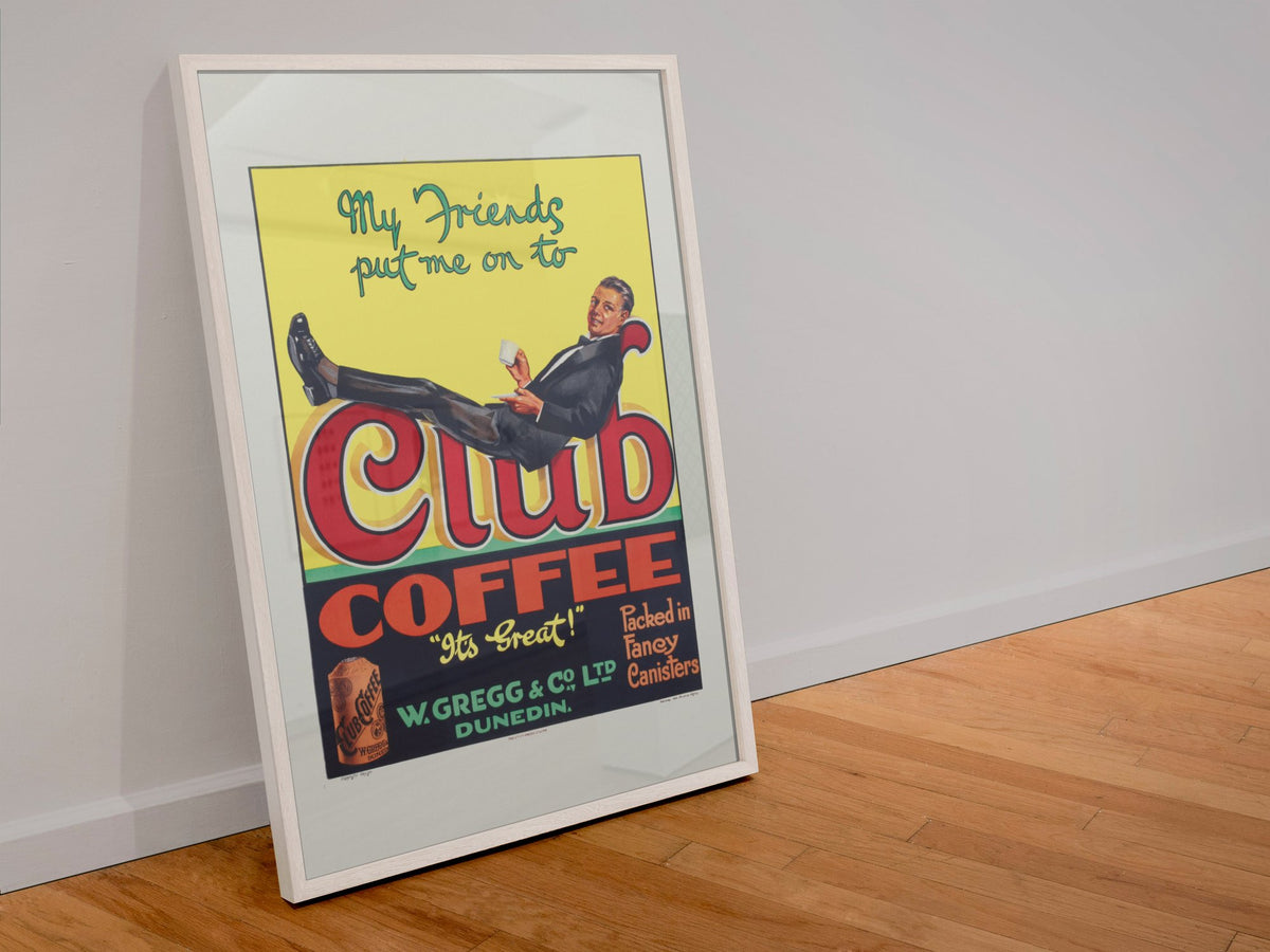 Club Coffee 1920s poster in a white frame leaning against a wall