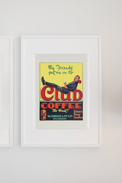 Club Coffee 1920s poster in a white frame on a light wall