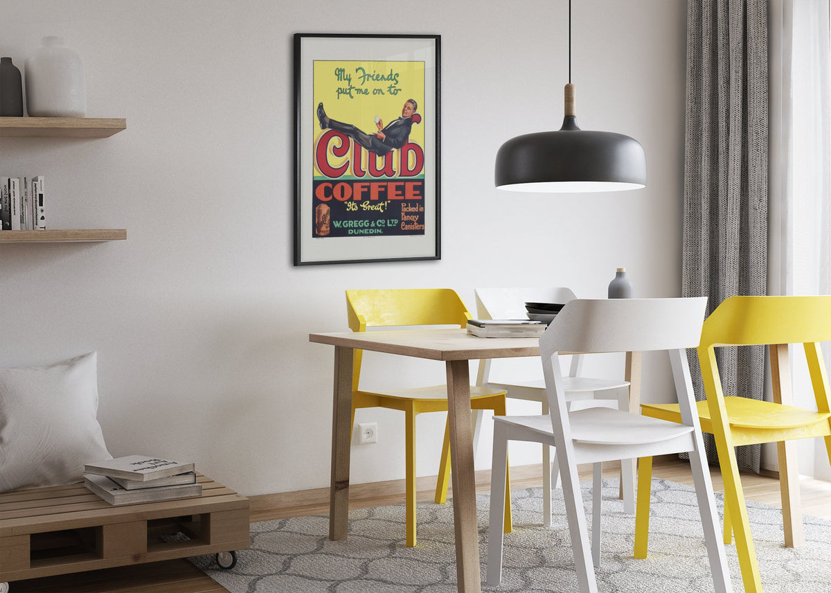 Club Coffee 1920s poster framed above a dining table