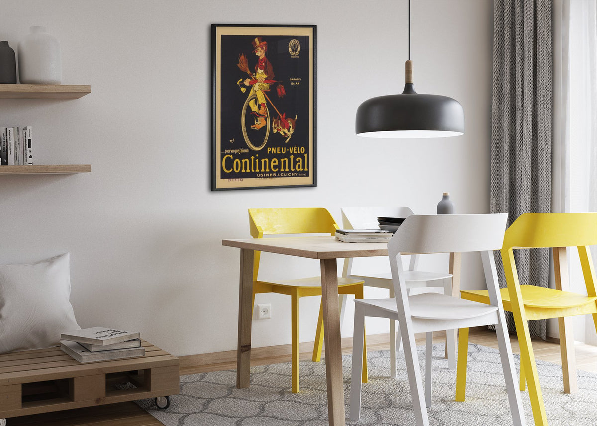 Continental Pneu Velo Tramp poster framed above a dining table