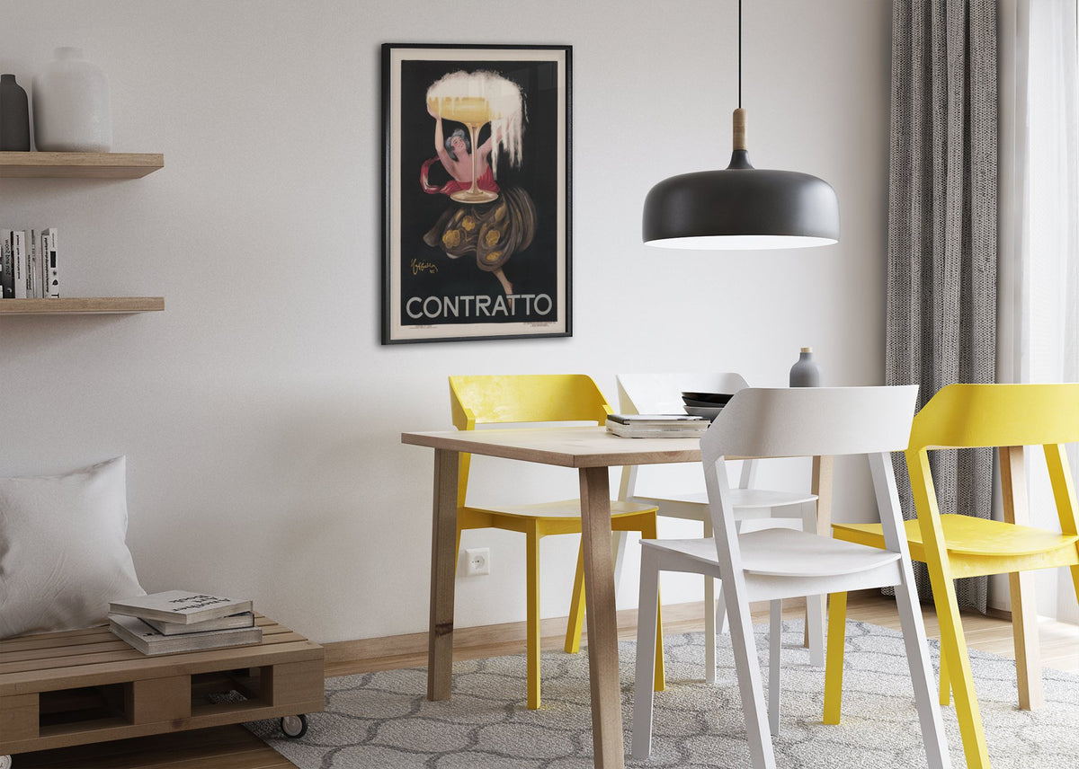 Contratto 1922 champagne by Cappiello poster framed above a dining table
