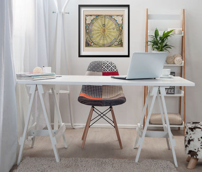 Copernicus Planisphere 1660 print framed above a white desk in a home office