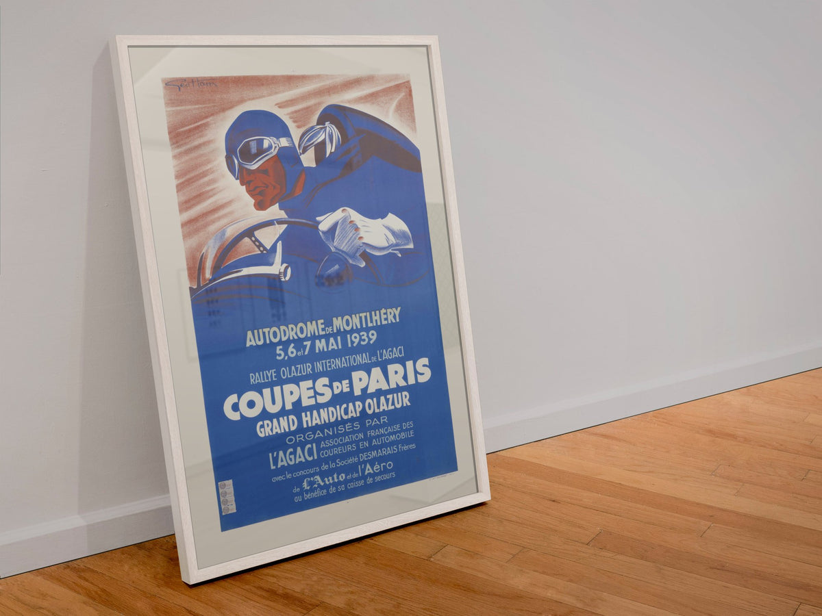 Coupes de Paris Montlhéry 1939 poster in a white frame leaning against a wall