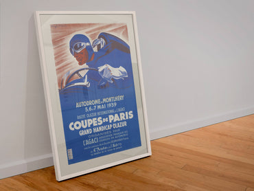 Coupes de Paris Montlhéry 1939 poster in a white frame leaning against a wall