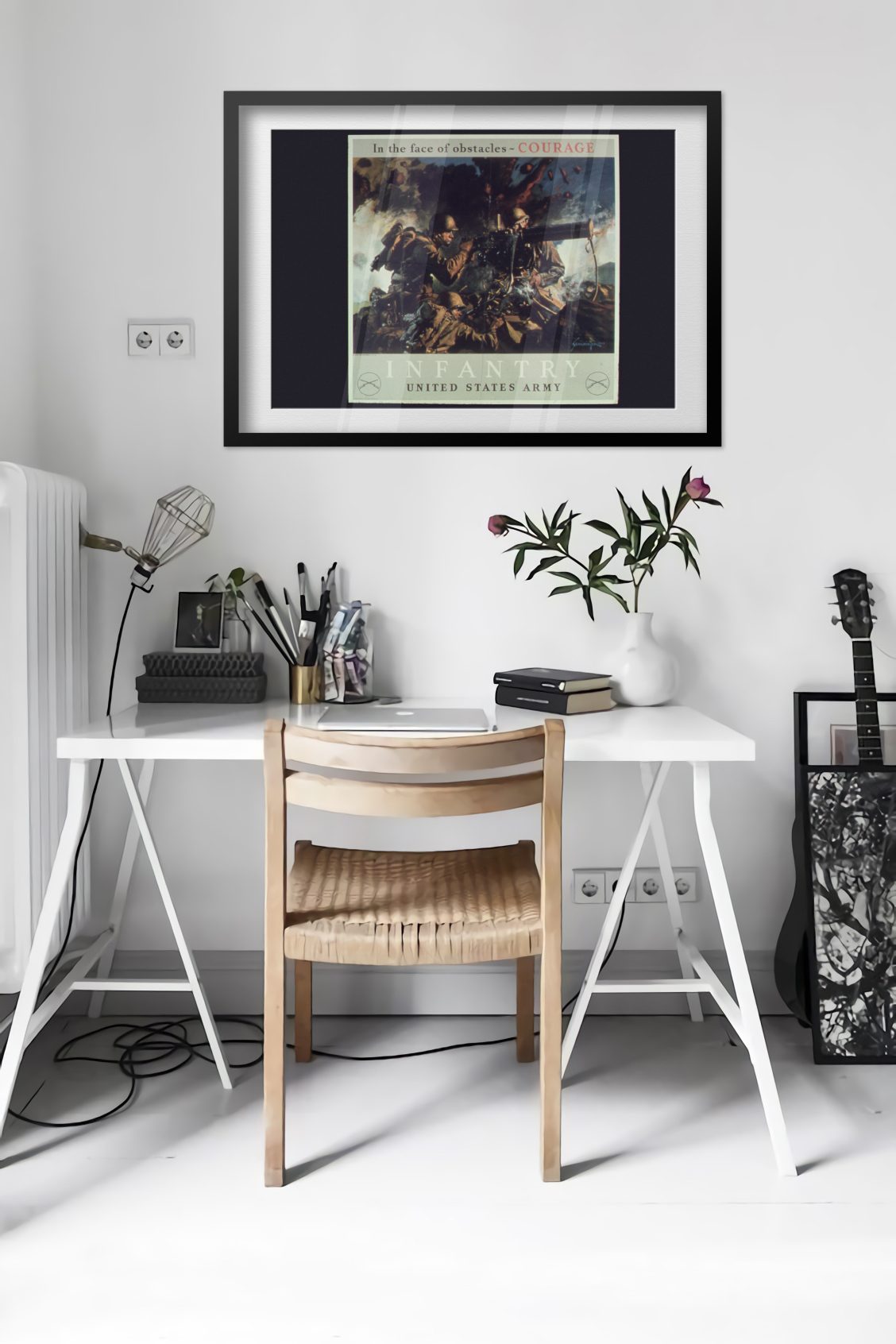 Courage Infantry United States Army poster framed above a desk in a bright white room